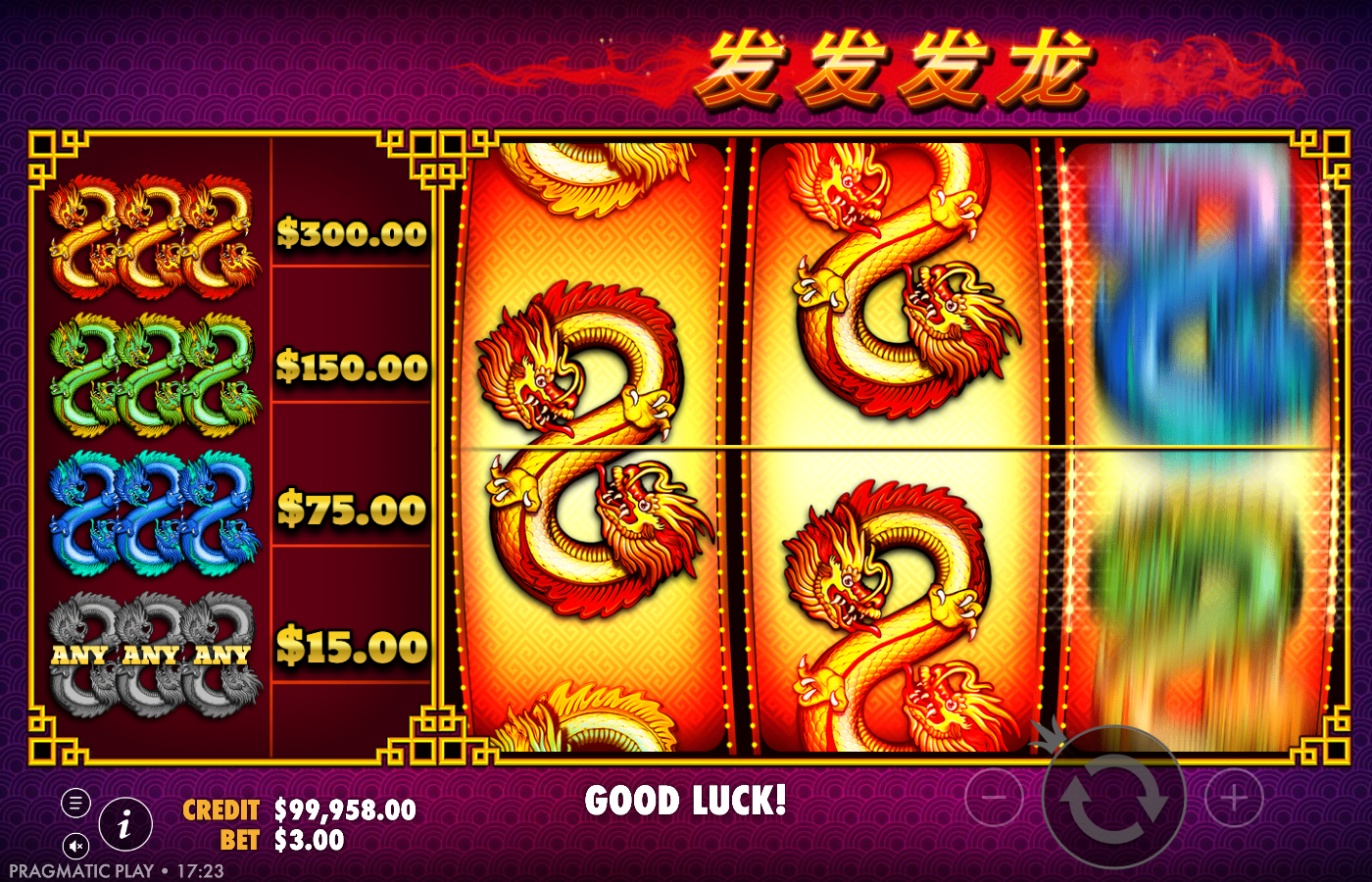 888 Dragons live base game action frame with two red and gold dragons landed on reels 1 and 2 on the centre line and reel 3 still spinning under a GOOD LUCK state