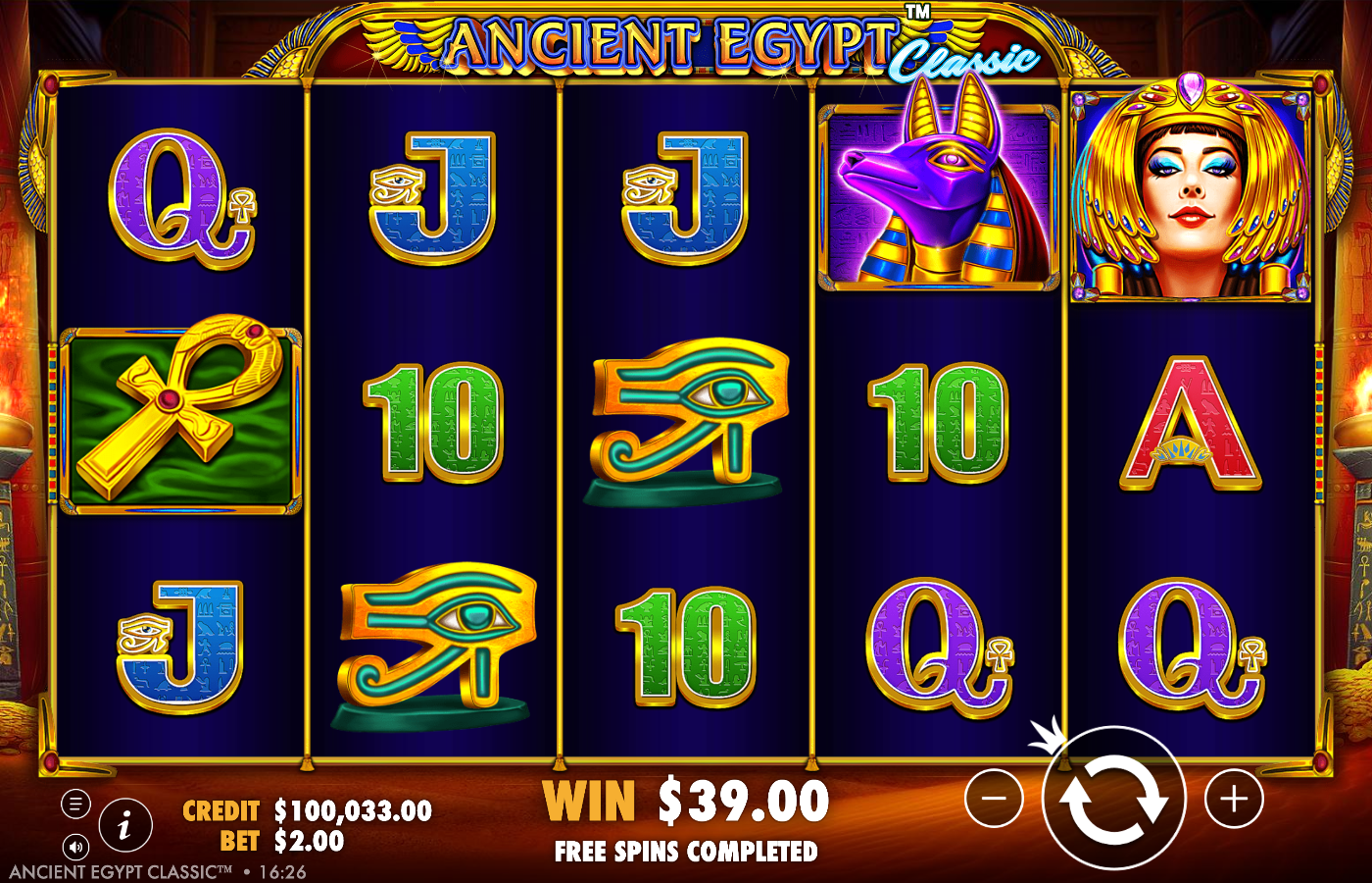 Ancient Egypt Classic base game on a 5 by 3 grid with the ANCIENT EGYPT Classic logo across the top, Cleopatra, Anubis, an Ankh cross, the Eye of Horus and card royals framed by golden Anubis-statue pillars, showing CREDIT A$100,033.00 and BET A$2.00