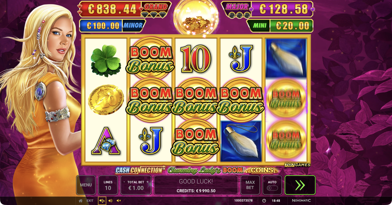 Multiple Boom Bonus symbols and Boom Coins landing on the reels, the build toward the Boom Spins.