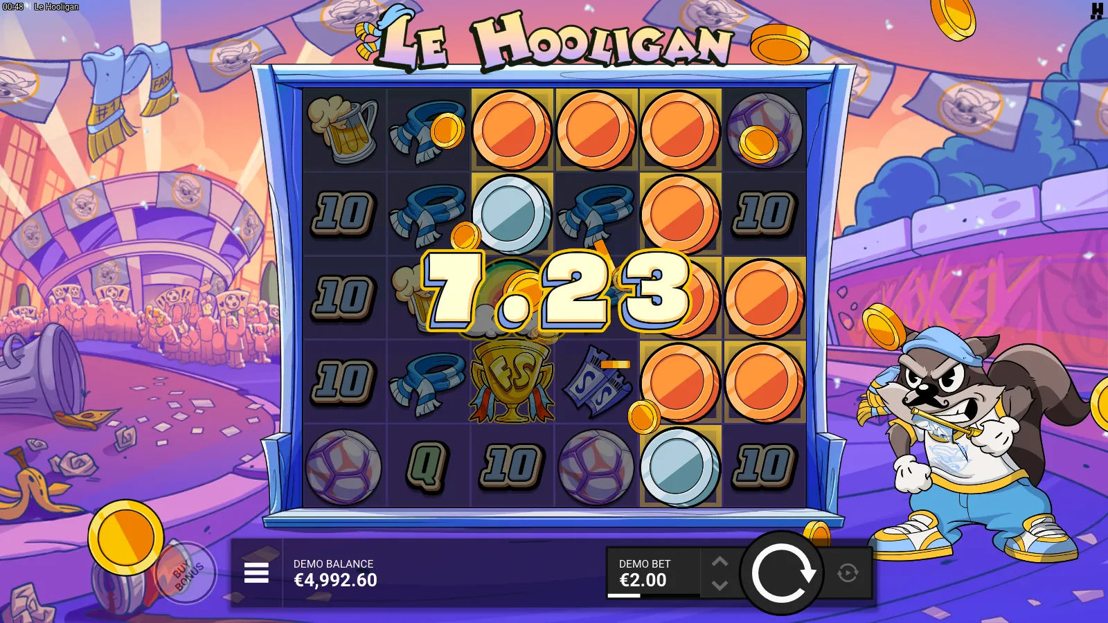 Le Hooligan Shiny Coins feature firing with a 7.23 cluster payout, Rainbow-revealed orange and blue coin tokens covering the grid and Smokey the Raccoon celebrating beside the reels