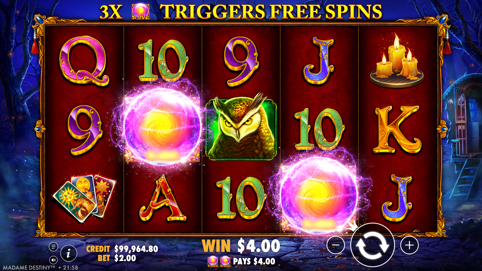 Two crystal ball Scatter symbols paying in Madame Destiny, three of them award 15 free spins