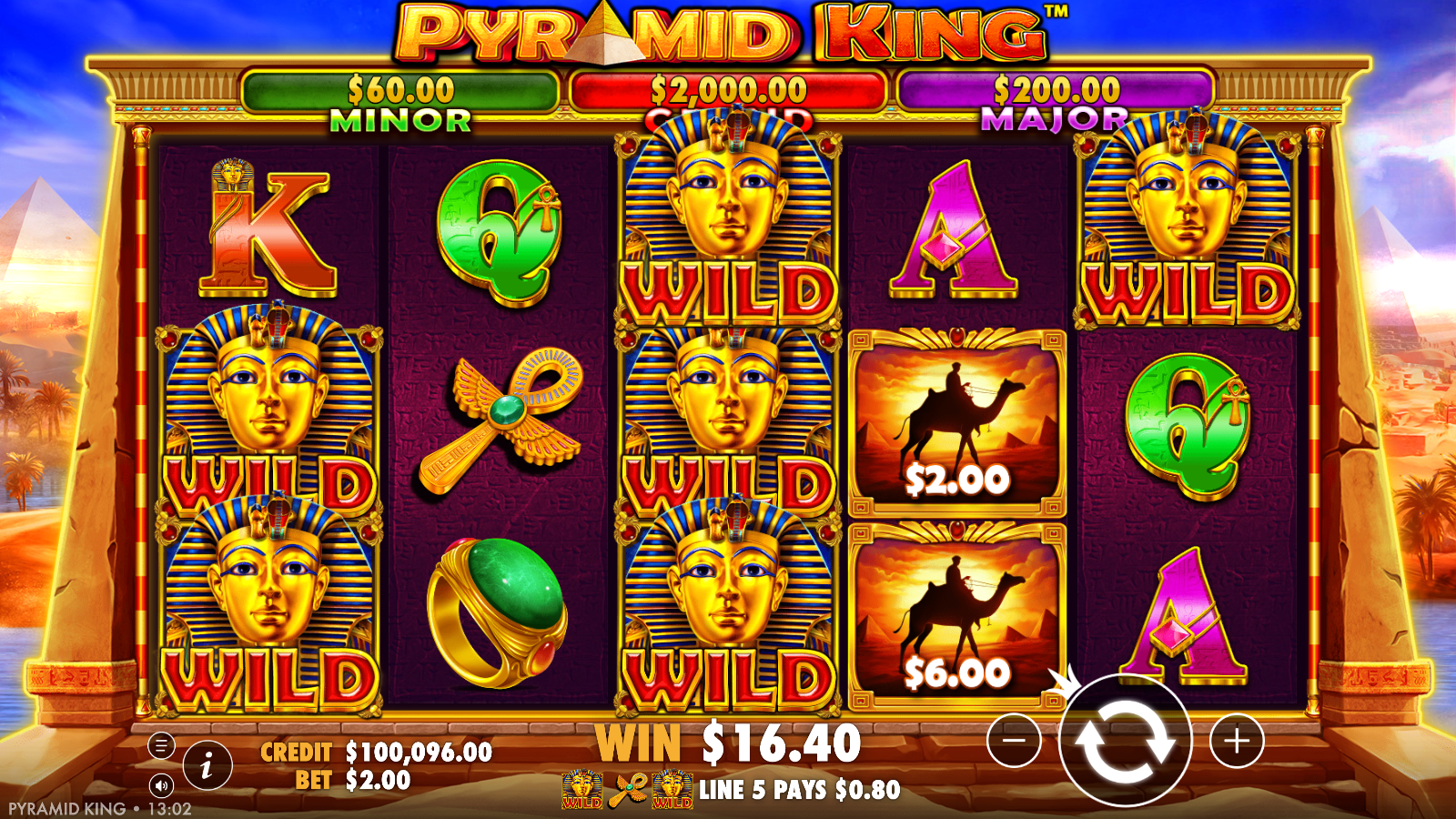 Pyramid King line win with stacked pharaoh Wild symbols across the reels