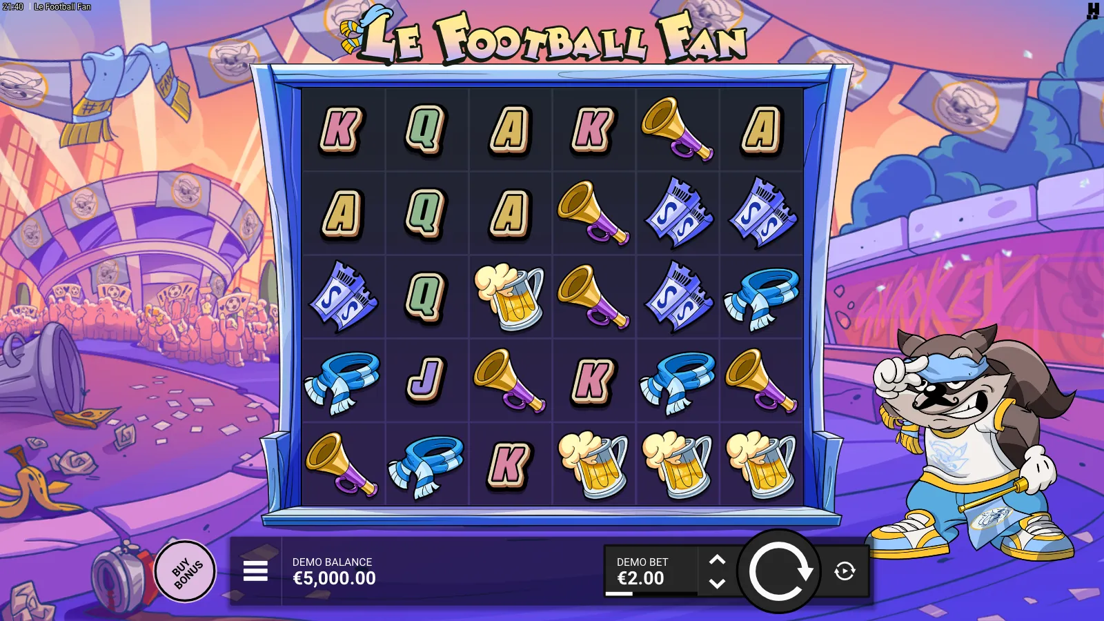 Le Football Fan base game grid showing the 6x5 cluster layout with football scarves, vuvuzelas and Smokey the Raccoon mascot framing the stadium banner background